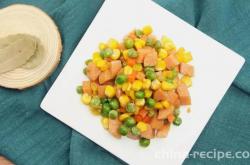 The method of stir frying diced carrots, corn kernels, and green beans
