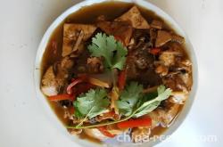 The recipe for stewed tofu with fish head