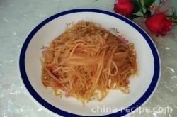 The method of stir frying tomatoes and potatoes