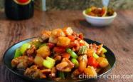 The method of stir frying diced chicken and potatoes