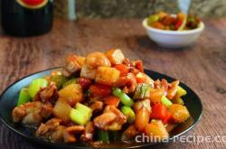 The method of stir frying diced chicken and potatoes