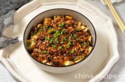 The method of steaming tofu with minced mushroom meat