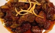 The recipe for braised pork ribs with orange sauce