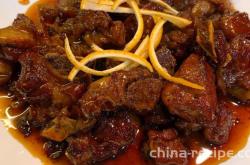 The recipe for braised pork ribs with orange sauce