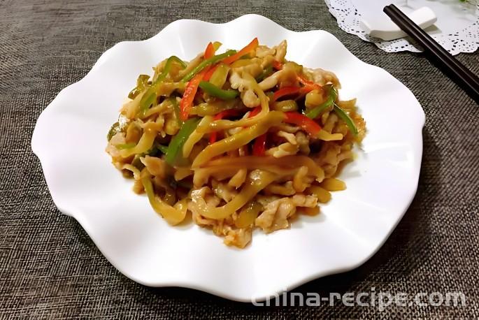 The method of stir frying shredded pork with pickled vegetables
