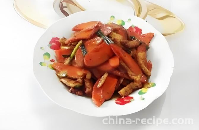 The method of stir frying pork with carrots