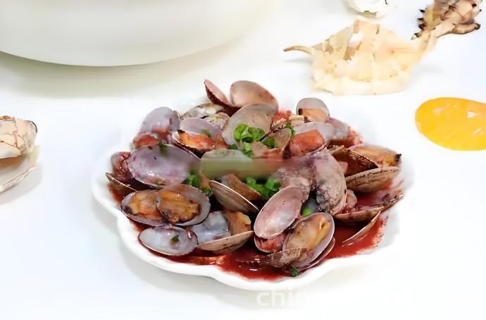 The method of stir frying clams with red lees