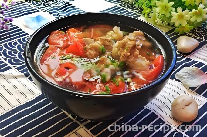 The method of stewing pork ribs with tomatoes