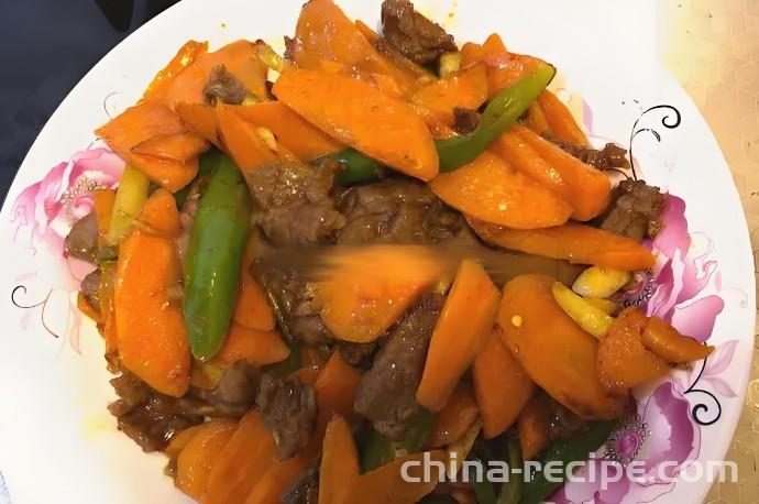 The method of stir frying beef with carrots