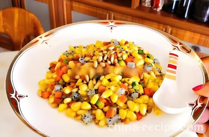 The method of stir frying pine nuts with corn