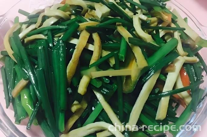 Stir fried dried tofu with leek flower