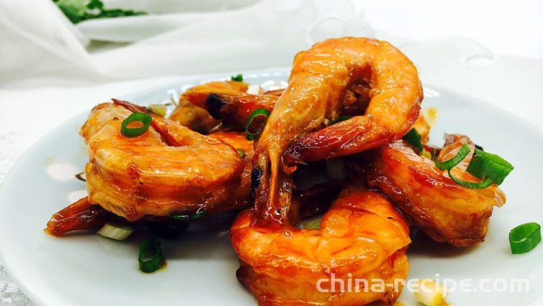 The method of braising prawns in tomato sauce