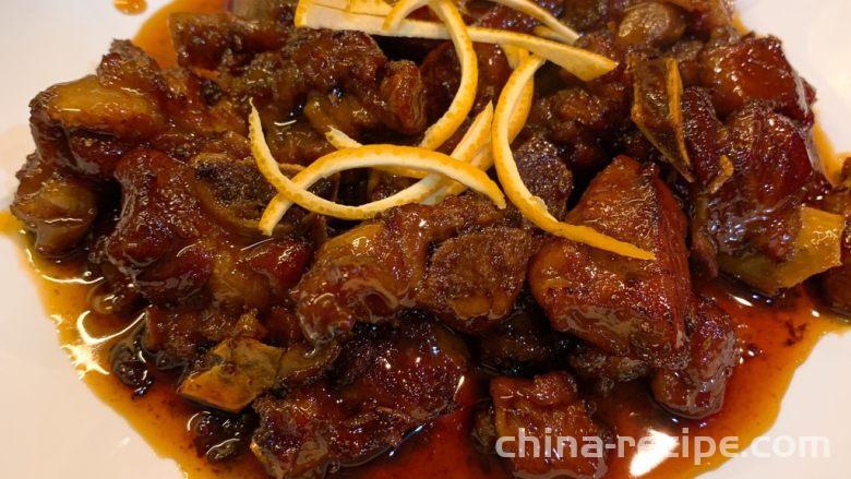 The recipe for braised pork ribs with orange sauce